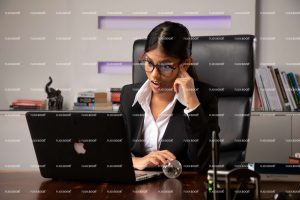 sitting on chair, office, professional, girl, laptop, working on laptop, full suite, black suite, business, wow, suprised, suprise, specs girl, girls, thinking, sitting in office, , meeting, business lady