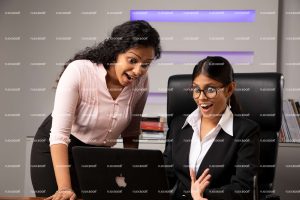 sitting on chair, office, professional, girl, wow, excited, laptop, working on laptop, full suite, black suite, business, happy, smile, laughing, specs girl, girls, thinking, sitting in office, smiling , meeting, business ladies