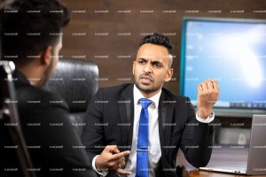 
									office, professional, boy, man, black suite, meeting room, sitting on chair, office suite, business guys, thinking, explaining, business guy