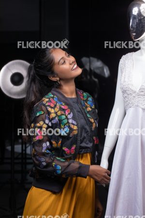 
									Woman working as a tailor , Fashion, Design, Designer,  Clothes. Mannequin, Dummy, casual outfit , smiling , hard work , happy , smiling , looking at dummy 