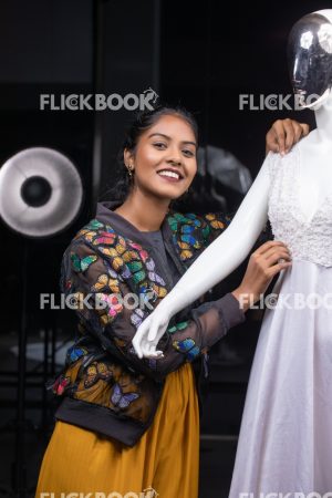 
									Woman working as a tailor , Fashion, woman adjusting dummy dress, Design, Designer,  Clothes. Mannequin, Dummy, casual outfit , smiling , hard work , happy , smiling , 