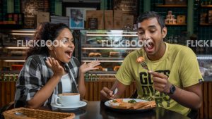 
									Food , a couple , having a breakfast meal , smiling , happy , at a cafeteria , having a glass of coffee / tea