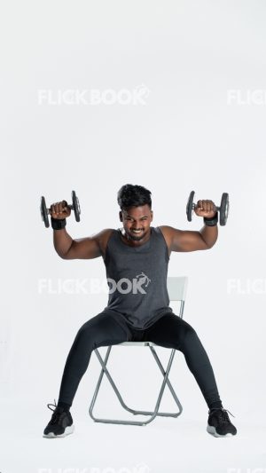 Muscular Man Exercising with Dumbbells While Sitting on Chair, Active, Weight Dumbbells, Fitness, Strong, Muscular Man, Holding Two Weight Dumbbells, Strong Guy