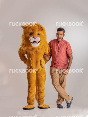 
									Entertainment , lion costume , brown , a guy standing , laughing , surprised , brown  , standing