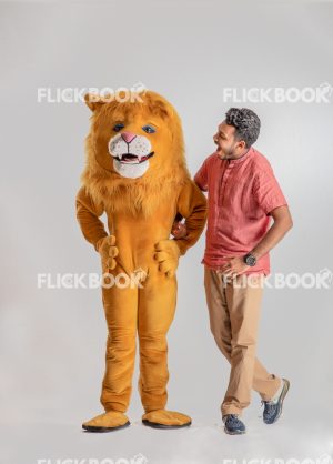 Entertainment , lion costume , brown , a guy standing , laughing , surprised , brown  , standing