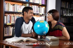 
									Library , a couple , world map ball , studying , smiling , searching , books 