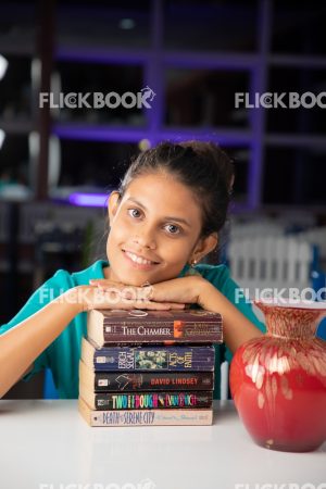 
									Library , books , casual outfit , sitting , happy , girl , staring , posing , smiling , chin on books