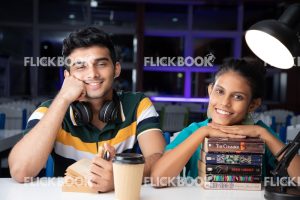 
									Library , books , casual outfit , sitting , happy , couple , staring , posing , happy , smiling , chin on books