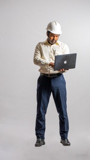Occupations , contractor, busy , formal outfit , guy , standing , working , laptop 