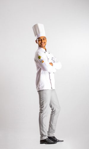Occupations , chef , young guy , happy , smiling