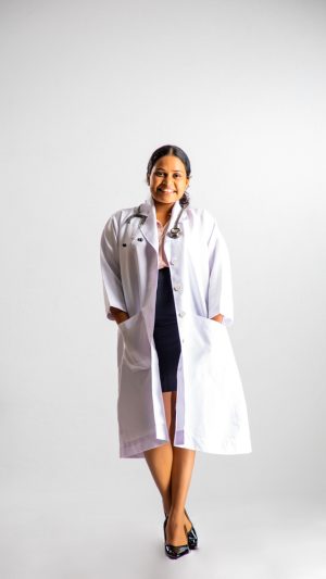 Occupations , doctor , lady , stethoscope , smiling , happy , standing