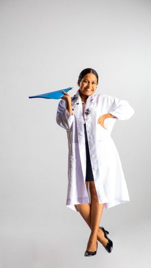 Occupations , doctor , lady , file , stethoscope , smiling , happy , standing