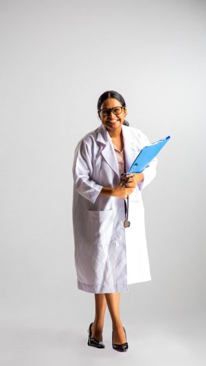 Occupations , doctor , lady , file , stethoscope , smiling , happy , standing ,