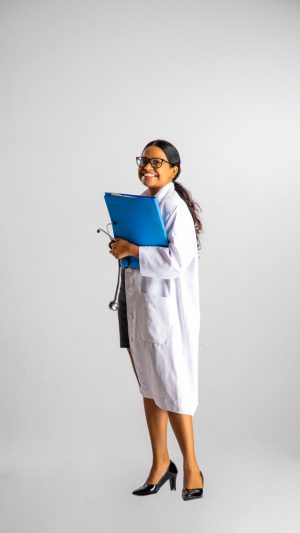 Occupations , doctor , lady , file , stethoscope , smiling , happy , standing ,  