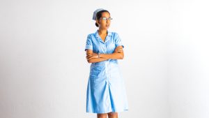 Occupations , nurse , nurse outfit , costume , thumbs up , smiling , happy , folded hands 