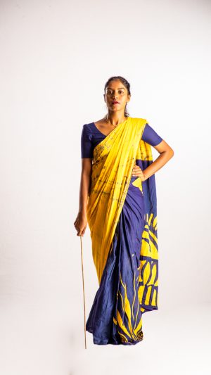 Occupations , teacher , girl , file , standing , wearing saree , strict , punishing , stick 